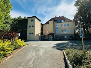 a street with two buildings on the side of a road at GER-Haus in Waischenfeld