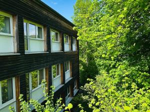 a building with windows on the side of it at GER-Haus in Waischenfeld