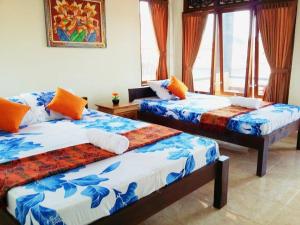 Ένα ή περισσότερα κρεβάτια σε δωμάτιο στο Sadru House