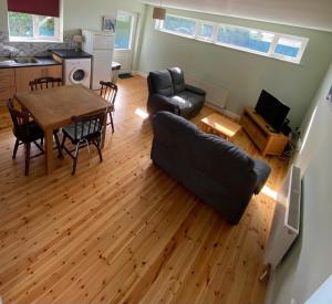 an aerial view of a living room with a table and a couch at Claddagh in Galway
