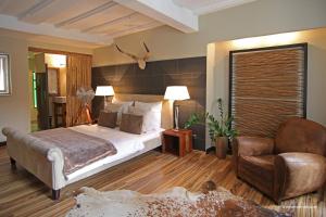 Postel nebo postele na pokoji v ubytování Elements Hotel