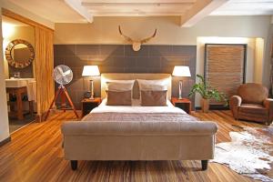 Postel nebo postele na pokoji v ubytování Elements Hotel