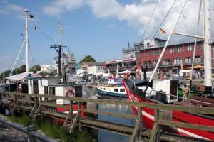 a group of boats docked at a marina at Warnemünde Fischer`s Hus 10139 in Rostock