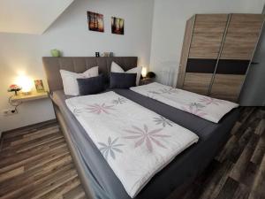 a bedroom with two beds in a room at Ferienhaus Voss in Alt Zauche