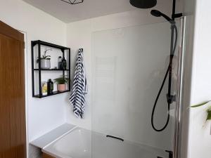 a bathroom with a shower and a sink at Ravelston in Edinburgh