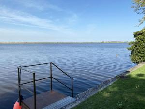 a boat in the middle of a large body of water at April in Caleri