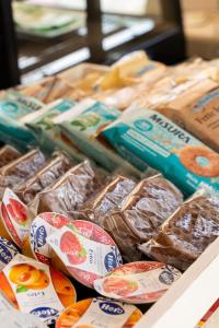a box filled with different types of food on a table at B&B Annita in Porto Cesareo +24 photos