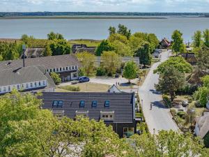 an aerial view of a town with a lake at Ferienwohnung Boddenschnacker in Born