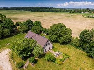 an overhead view of a house in the middle of a field at Ferienwohnung im Spöckerhus in Tribohm +28 photos