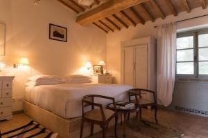 Ein Bett oder Betten in einem Zimmer der Unterkunft Wine Resort Conti di San Bonifacio