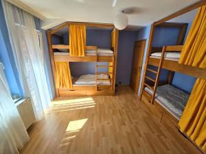 a room with four bunk beds in it at Good Hostel Prishtina in Prishtinë