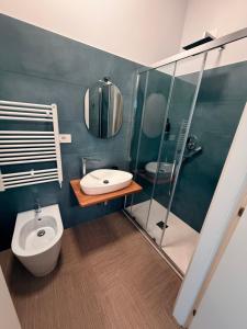 a bathroom with a toilet and a sink and a shower at B&B Nido degli Ulivi in Catanzaro +86 photos