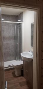 a bathroom with a sink and a shower and a toilet at The Star Inn in North Dalton +7 photos