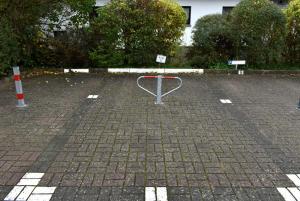 a parking lot with a basketball hoop in the middle at Sonnenseite Ferienwohnung in Niendorf