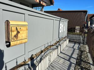 a painting of a deer on the side of a building at Ferienhaus HarzHase in Harzgerode