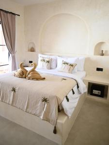 Tempat tidur dalam kamar di Koa Coco Casa