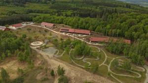 an aerial view of a park with a train on a track at Bardo CAMP in Bardo