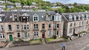 an aerial view of a row of houses at 173 Newark Street, Greenock in Greenock
