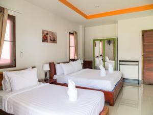 Postel nebo postele na pokoji v ubytování Breeze Bay Villa