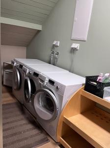 a washer and dryer in a room at Thomas Appartement in Stühlingen