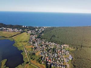 an aerial view of a town next to a body of water at Haus Strandkiefer in Baabe