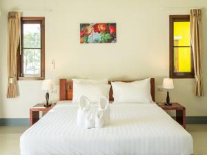 Postel nebo postele na pokoji v ubytování Breeze Bay Villa