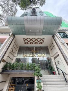 a building with a surprised amazon sign on it at Queen Ann Hotel in Ho Chi Minh City
