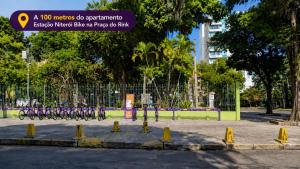 a bunch of bikes parked next to a fence at Apartamento Nictheroy in Niterói