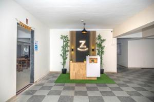 a lobby with a number z on the wall at Z Express Zen Elite in Pune