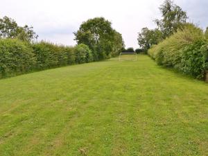 a field with a soccer goal in the middle of it at No 2 Flowery Bank in Malton