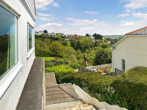 a view from the balcony of a house at Whitestones in Saint Mawes +26 photos