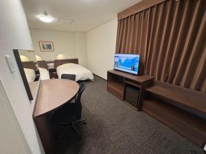 Телевизор и/или развлекательный центр в Hotel Alpha-One Iwaki
