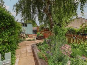 a garden with a lot of flowers and plants at 6 Bedford Place in Bridport