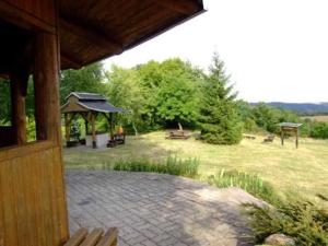 a view of a yard with a gazebo at Ferienhaus Hofmann Hainrode in Hainrode