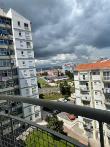 a view from the balcony of a apartment building at my house in Lisbon