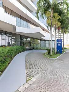 an external view of a building at BHS Flat a beira mar 2203 in Recife