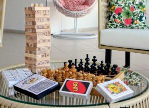 a chess set on a table in a room at Hotel Asturias in Girardot