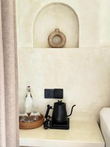 Fasilitas pembuat kopi dan teh di Koa Coco Casa +40 foto
