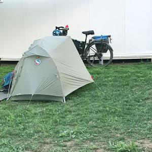 a tent sitting in the grass next to a bike at Free People Camping in Vama Veche +54 photos