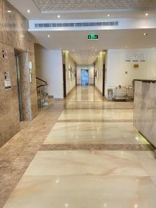 an empty hallway in a building with a hospital at شقق الشرفة للشقق المفروشة -AlSHORFA FURNISHED APARTMENT in Riyadh