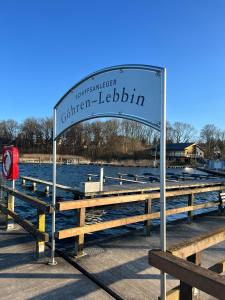 a sign for a german legislature on a pier at Ferien_HAUS SEEOASE in Göhren-Lebbin +13 photos