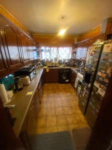 an overhead view of a large kitchen with at A Spacious Odyssey in Dagenham