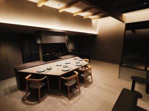 a large dining room with a table and chairs at THE THIRD PLACE Mt Fuji in Fujikawaguchiko