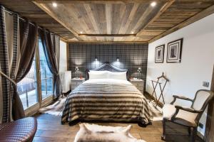 Postel nebo postele na pokoji v ubytování Le Chalet Blanc
