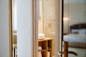 a bathroom with a sink and a shower at hôtel LE PACHA in Tunis