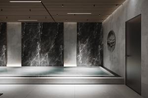 a room with a black marble wall at Lake Charvak Resort in Burchmulla +23 photos