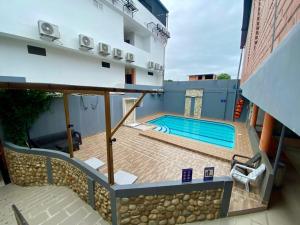 a swimming pool on the roof of a building at Hotel Cima Real in Arauca +9 photos