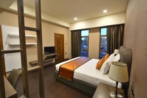 Speke Apartments Wampewo客房内的一张或多张床位