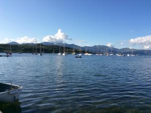 a group of boats in a large body of water at Cool Getaway in Appin in Portnacroish