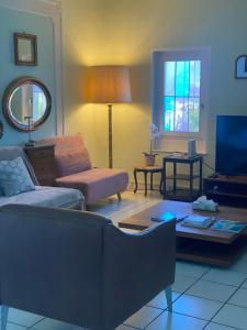 a living room with a couch and a coffee table at Villa Incanto in Ascona